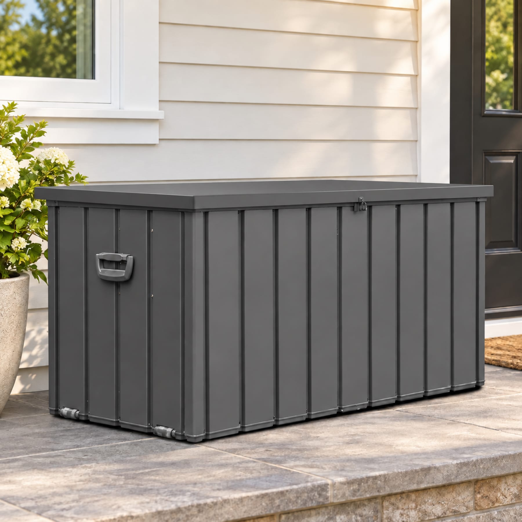 Dark Gray 200 gallon outdoor steel storage deck box on a residential front porch