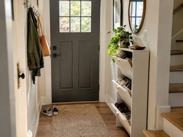 Slim shoe cabinet organizing everyday shoes in a small entryway