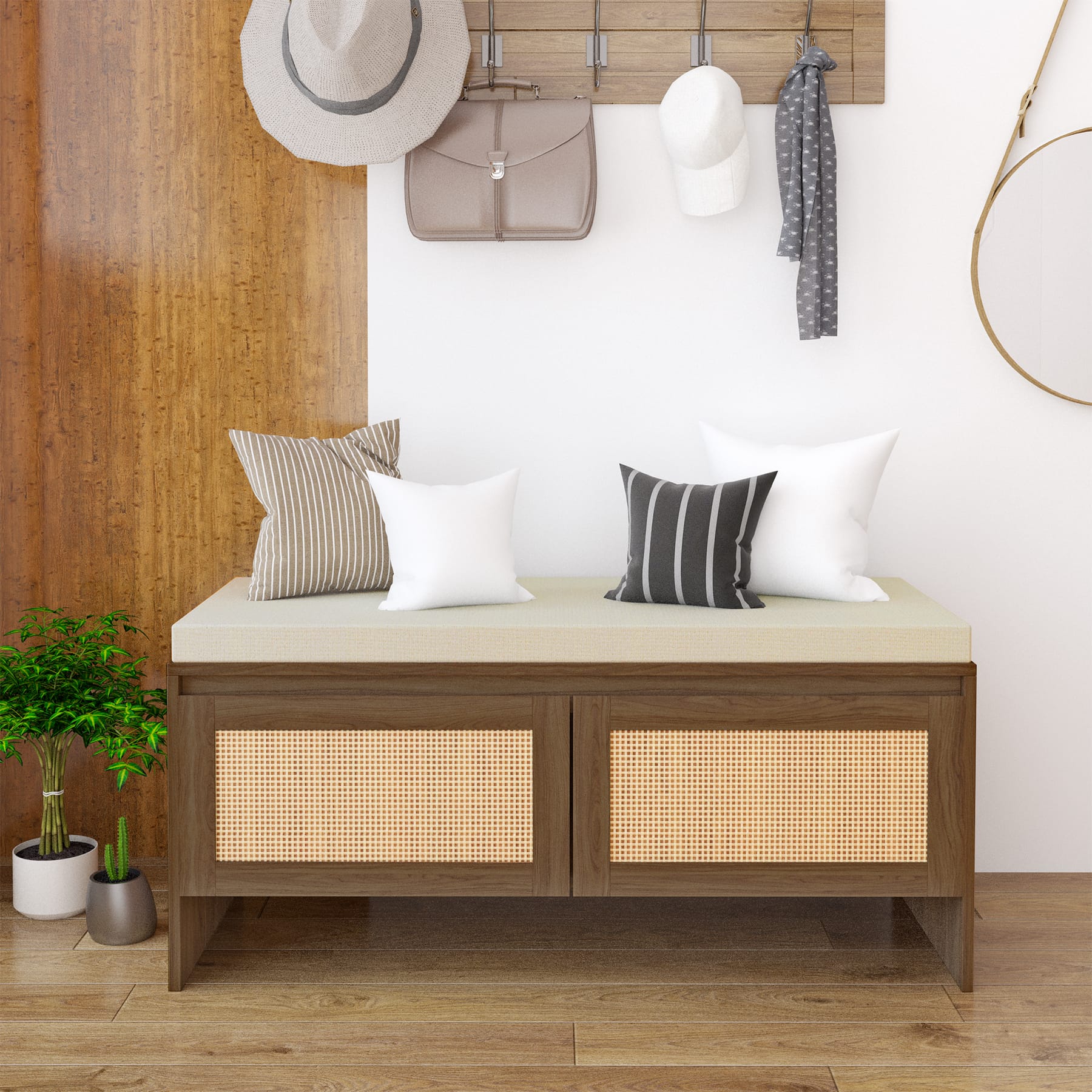Entryway shoe storage bench with cushioned seat and faux rattan cabinet doors styled with pillows