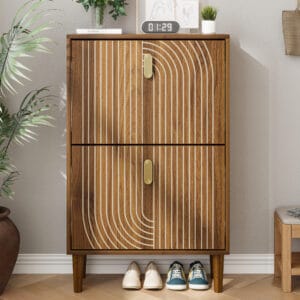 Narrow brown shoe cabinet with two flip-down drawers placed against an entryway wall