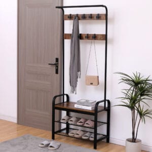 Narrow rustic brown hall tree with shoe bench, two-tier shoe rack, 9 hooks, and hanging rod by an entryway door
