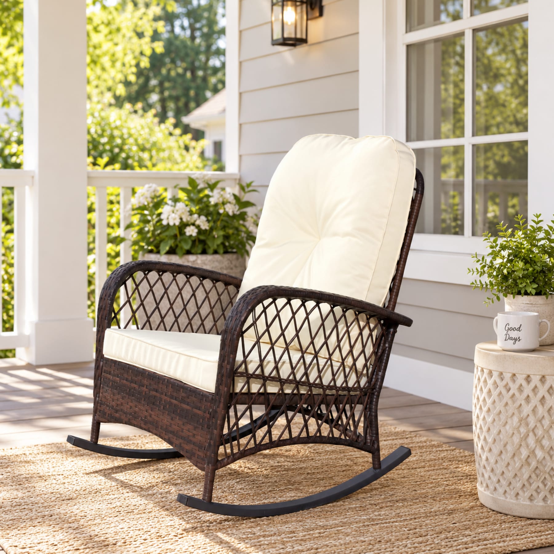 Brown PE rattan outdoor rocking chair with Beige seat and back cushions on a bright front porch