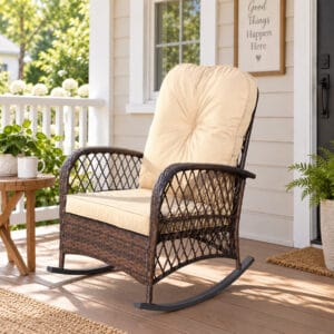 Brown PE rattan outdoor rocking chair with Shallow Brown seat and back cushions on a bright front porch