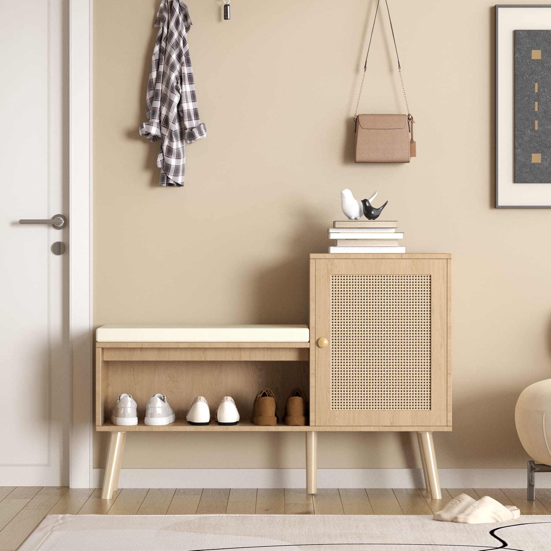 Shoe storage bench with cushioned seat and faux rattan cabinet placed beside an entryway door