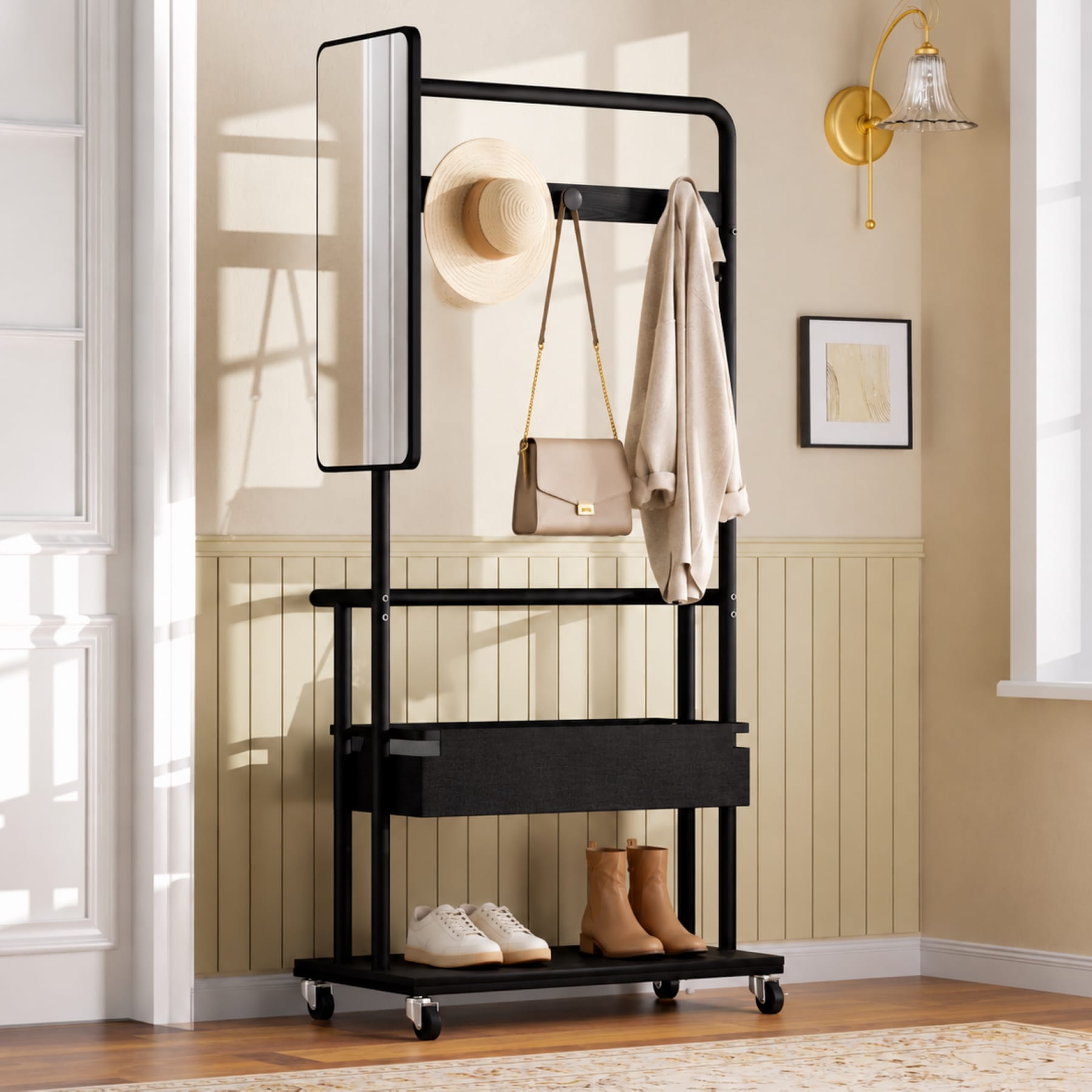 Black rolling coat rack with side mirror, hanging hooks, fabric storage basket, and lower shoe shelf in an entryway
