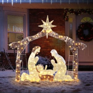 190 LED brown roof Christmas Nativity scene with illuminated Bethlehem star and figures displayed outside a snowy front porch
