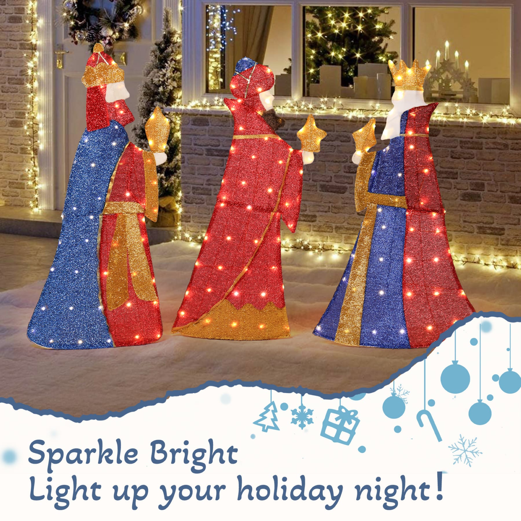 Three lighted Wise Men Christmas decorations carrying gifts, illuminated with warm white LED lights outside a home at night