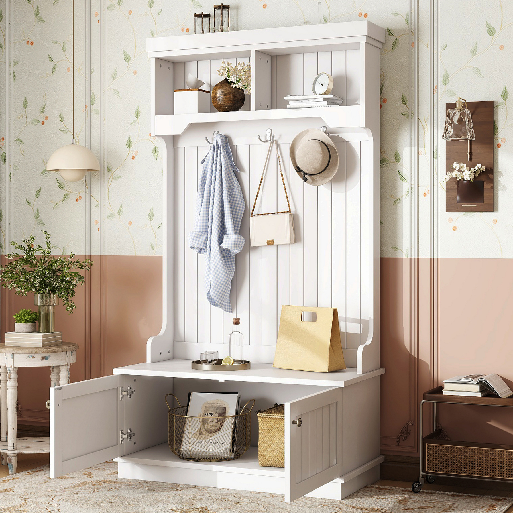 White entryway hall tree with storage bench and lower cabinet doors open